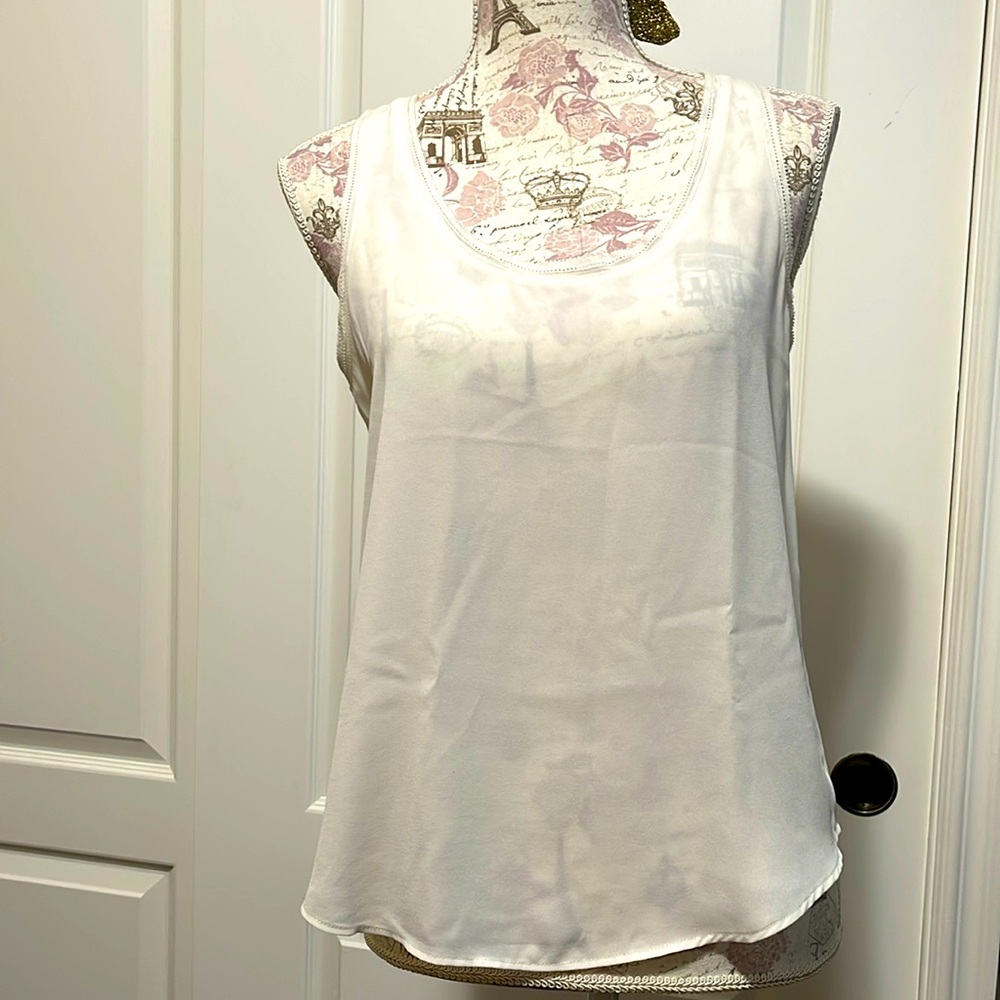 White sleeveless top